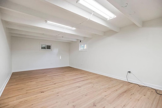 4428 N Monroe Ave, Kansas City, MO 64117 - basement with light wood-style floors and baseboards