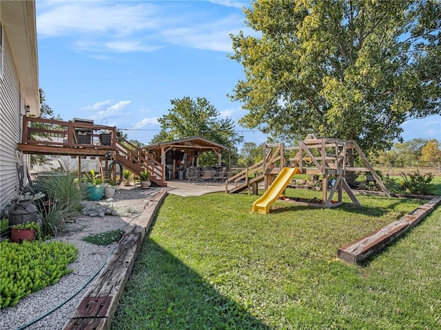 21318 S Briar Rd, Peculiar, MO 64078 - view of grassy yard with a playground, stairs, and a patio area