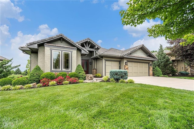 26793 W 100th Pl, Olathe, KS 66061 - view of front facade with concrete driveway, an attached garage, a front yard, and stucco siding