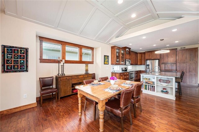 26793 W 100th Pl, Olathe, KS 66061 - dining room featuring lofted ceiling, dark wood finished floors, and recessed lighting