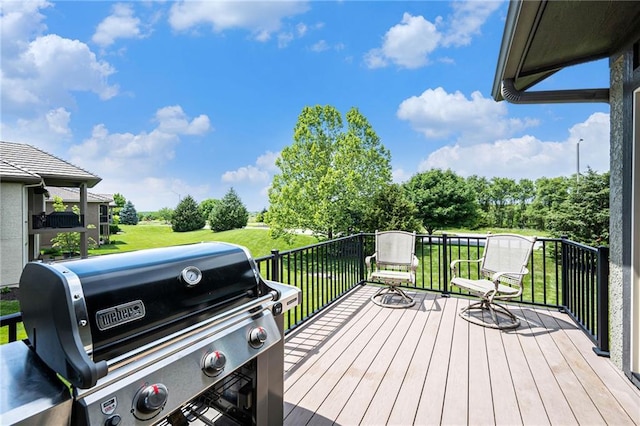 26793 W 100th Pl, Olathe, KS 66061 - wooden deck featuring grilling area and a lawn