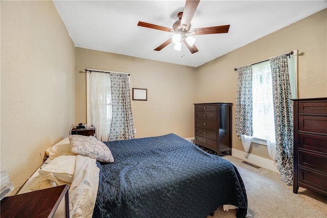1002 S Olive St, Holden, MO 64040 - bedroom with light carpet and ceiling fan