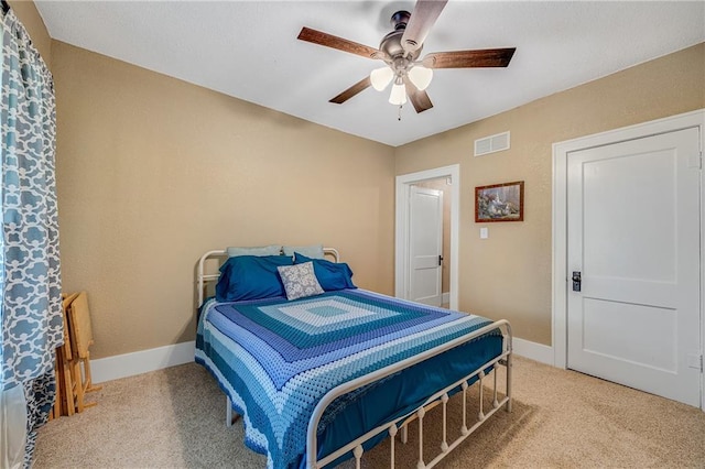 1002 S Olive St, Holden, MO 64040 - carpeted bedroom featuring baseboards and ceiling fan