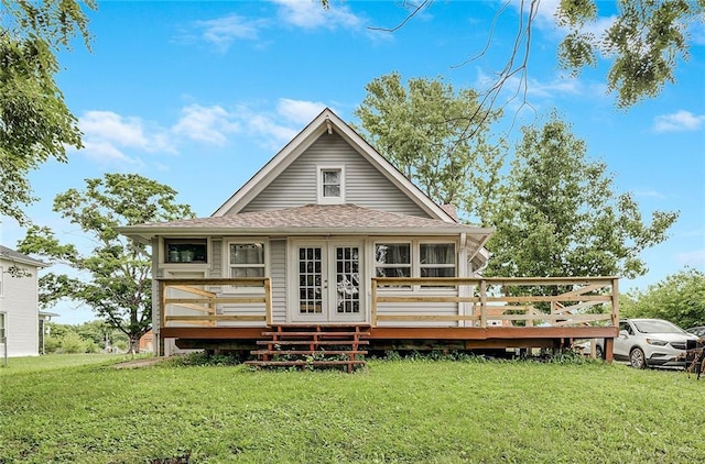 1002 S Olive St, Holden, MO 64040 - rear view of property with a wooden deck, a yard, and a shingled roof