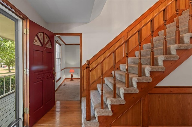 320 SW Raven Ct, Lees Summit, MO 64081 - entrance foyer featuring light wood-type flooring, plenty of natural light, and stairway