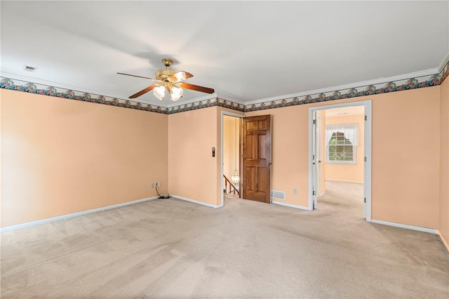 320 SW Raven Ct, Lees Summit, MO 64081 - carpeted spare room with a ceiling fan and ornamental molding