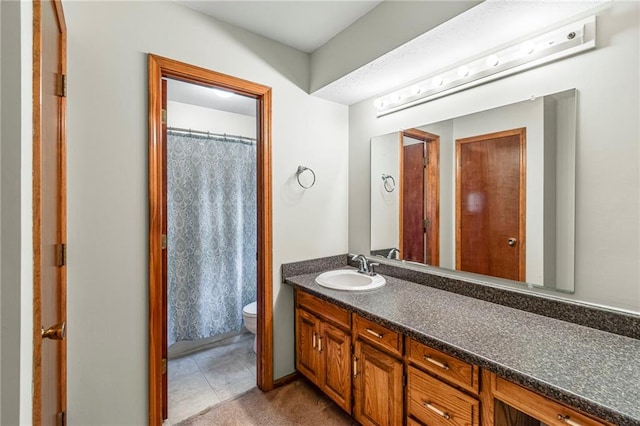 320 SW Raven Ct, Lees Summit, MO 64081 - bathroom featuring vanity and tile patterned flooring