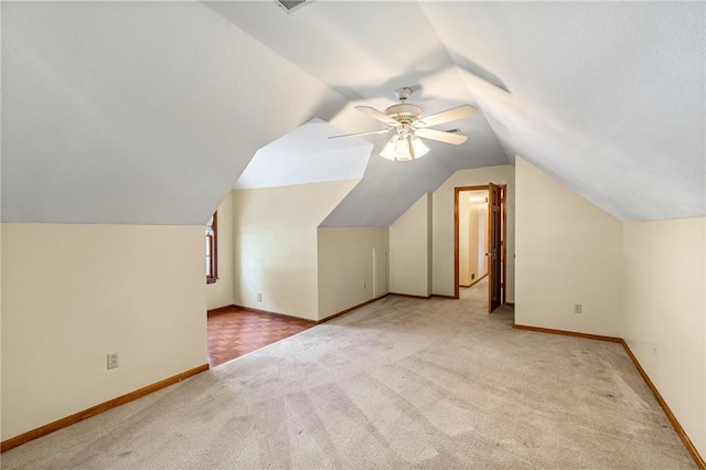 320 SW Raven Ct, Lees Summit, MO 64081 - additional living space with carpet floors, lofted ceiling, and ceiling fan