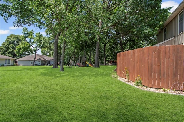 320 SW Raven Ct, Lees Summit, MO 64081 - view of yard featuring a playground
