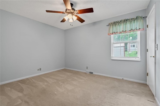 602 N Westview Dr, Richmond, MO 64085 - carpeted empty room with a ceiling fan and a textured ceiling