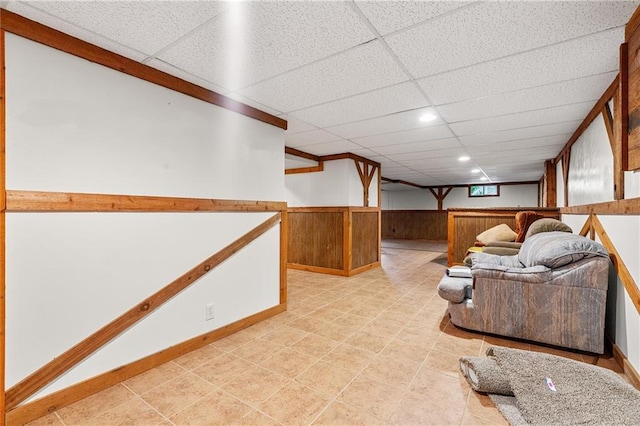 602 N Westview Dr, Richmond, MO 64085 - living area with a drop ceiling, wainscoting, recessed lighting, and wood walls