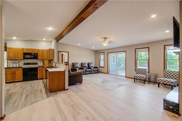 106 Timber Valley Dr, Linn Valley, KS 66040 - living room with light wood-style flooring, ceiling fan, a textured ceiling, and recessed lighting