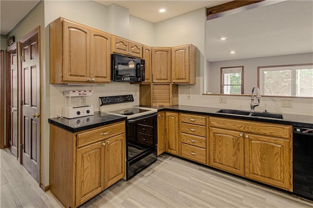 106 Timber Valley Dr, Linn Valley, KS 66040 - kitchen with black appliances, backsplash, recessed lighting, and light wood-type flooring