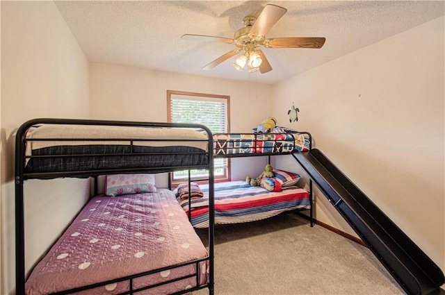 106 Timber Valley Dr, Linn Valley, KS 66040 - carpeted bedroom featuring ceiling fan and a textured ceiling