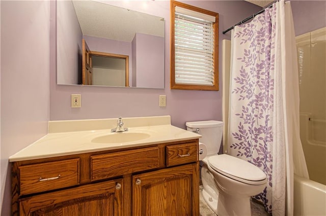 106 Timber Valley Dr, Linn Valley, KS 66040 - bathroom with vanity, shower / bath combo, and a textured ceiling