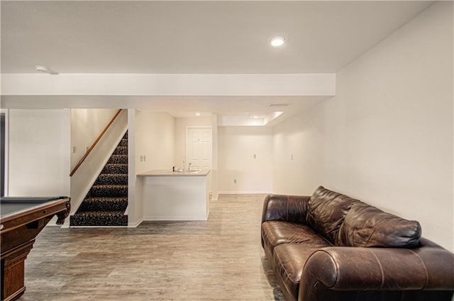 106 Timber Valley Dr, Linn Valley, KS 66040 - living area with wood finished floors, stairs, and recessed lighting