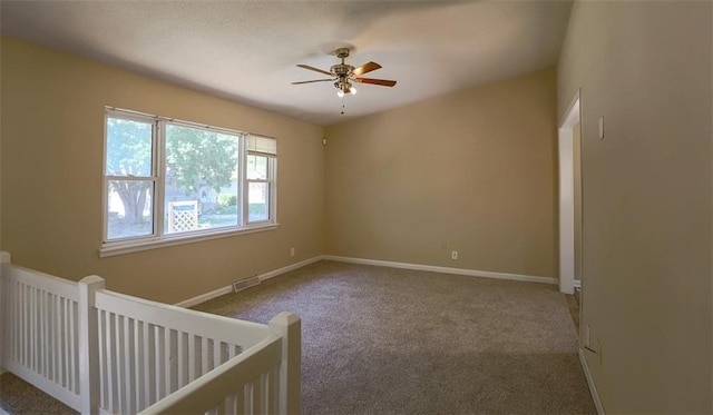 18205 E 27th St S, Independence, MO 64057 - unfurnished room featuring carpet flooring and a ceiling fan