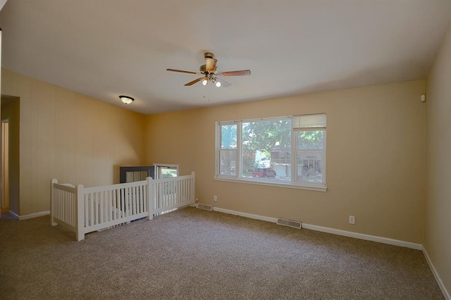 18205 E 27th St S, Independence, MO 64057 - empty room featuring ceiling fan and carpet