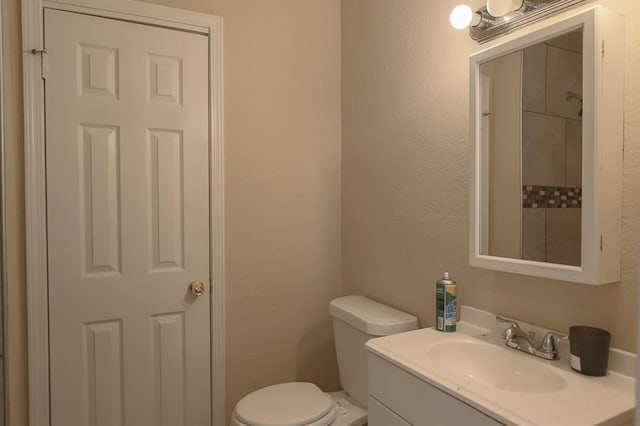 18205 E 27th St S, Independence, MO 64057 - bathroom with vanity and a textured wall