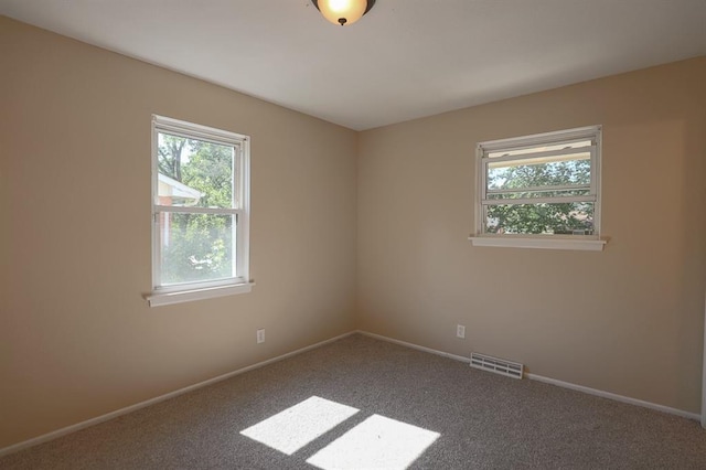 18205 E 27th St S, Independence, MO 64057 - carpeted spare room featuring healthy amount of natural light