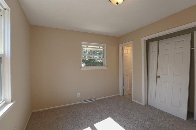 18205 E 27th St S, Independence, MO 64057 - unfurnished bedroom featuring carpet flooring