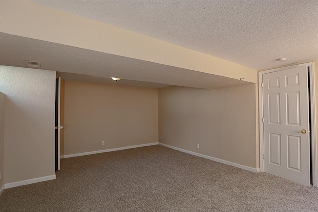 18205 E 27th St S, Independence, MO 64057 - finished basement with carpet flooring and a textured ceiling