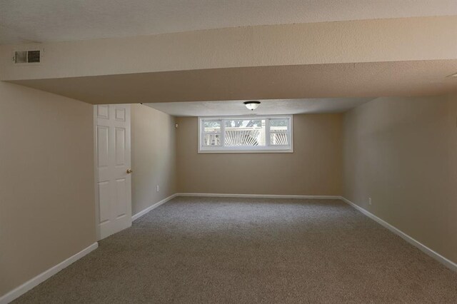 18205 E 27th St S, Independence, MO 64057 - basement with carpet flooring and baseboards