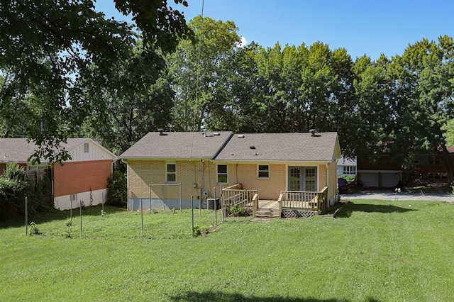 18205 E 27th St S, Independence, MO 64057 - rear view of house featuring a deck, a yard, french doors, and brick siding