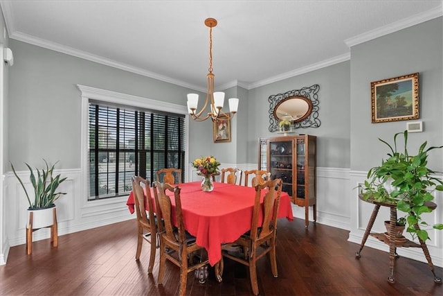 16642 W 165th St, Olathe, KS 66062 - dining room with a chandelier, dark wood-style floors, wainscoting, crown molding, and a decorative wall