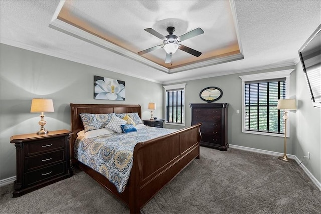 16642 W 165th St, Olathe, KS 66062 - bedroom featuring a tray ceiling, carpet flooring, crown molding, a textured ceiling, and a ceiling fan