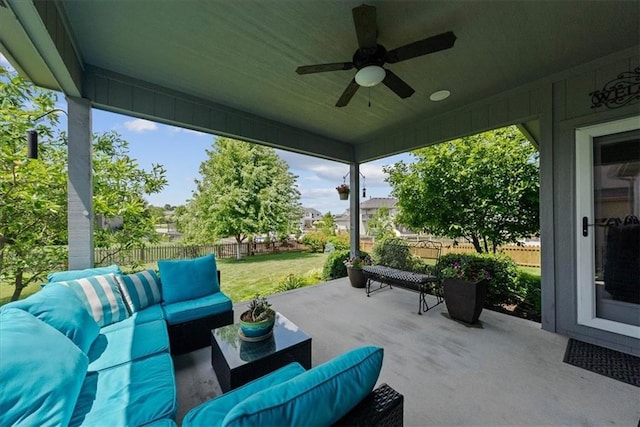 16642 W 165th St, Olathe, KS 66062 - fenced backyard with an outdoor living space, a patio area, and ceiling fan