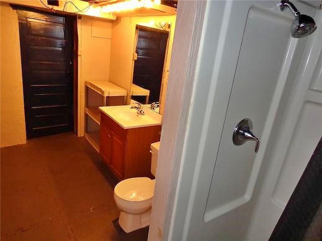 1915 S Elm St, Pittsburg, KS 66762 - bathroom featuring toilet and vanity
