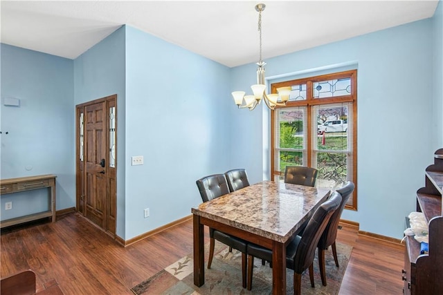 9305 NW 80th St, Weatherby Lake, MO 64152 - dining room with a chandelier and wood finished floors