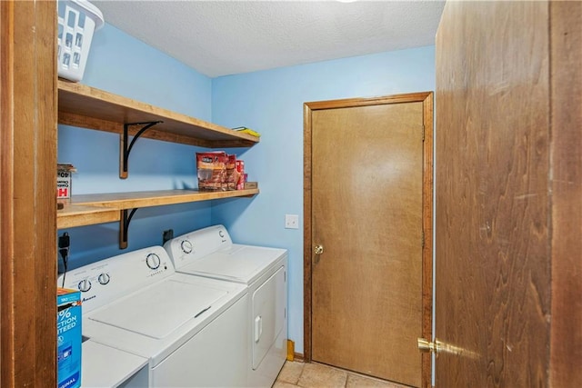 9305 NW 80th St, Weatherby Lake, MO 64152 - laundry area featuring washer and dryer and a textured ceiling