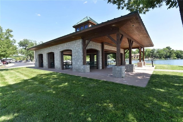 9305 NW 80th St, Weatherby Lake, MO 64152 - view of community with a yard and a water view