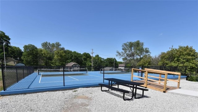 9305 NW 80th St, Weatherby Lake, MO 64152 - view of tennis court with view of scattered trees