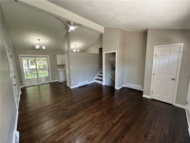 806 Lea Dr, Lees Summit, MO 64081 - unfurnished living room with dark wood-style floors, stairway, a ceiling fan, a textured ceiling, and a chandelier