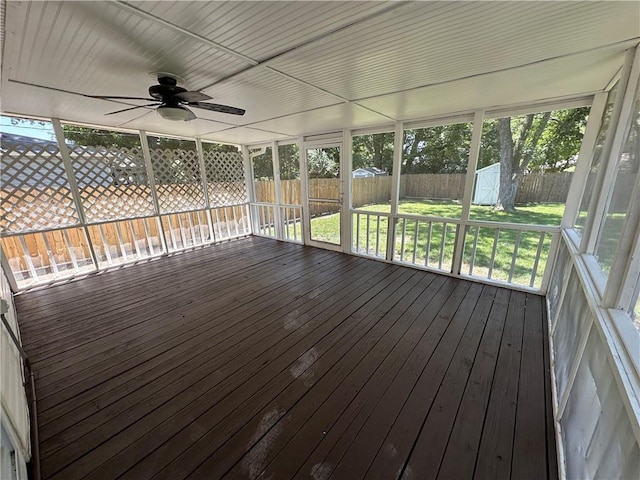 806 Lea Dr, Lees Summit, MO 64081 - unfurnished sunroom featuring ceiling fan and plenty of natural light