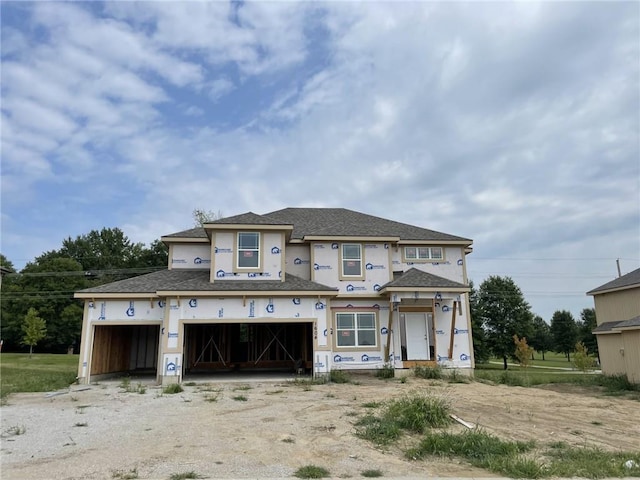 9011 N Colorado Ave, Kansas City, MO 64156 - property under construction with driveway, a garage, and roof with shingles