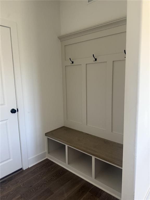 9011 N Colorado Ave, Kansas City, MO 64156 - mudroom featuring dark wood-style flooring and baseboards