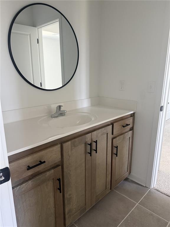 9011 N Colorado Ave, Kansas City, MO 64156 - bathroom with vanity and tile patterned floors