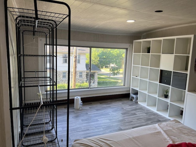 144 N Brighton Ave, Kansas City, MO 64123 - unfurnished bedroom with wood finished floors and wooden ceiling