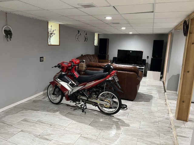 144 N Brighton Ave, Kansas City, MO 64123 - living area featuring a drop ceiling