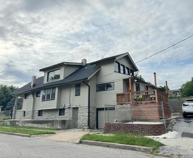 144 N Brighton Ave, Kansas City, MO 64123 - view of side of property featuring a chimney