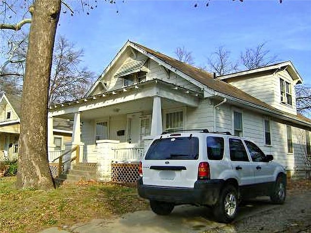 1915 S Broadway St, Pittsburg, KS 66762 - view of front of house featuring covered porch