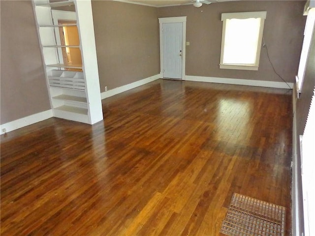 1915 S Broadway St, Pittsburg, KS 66762 - empty room with wood finished floors, ceiling fan, and ornamental molding