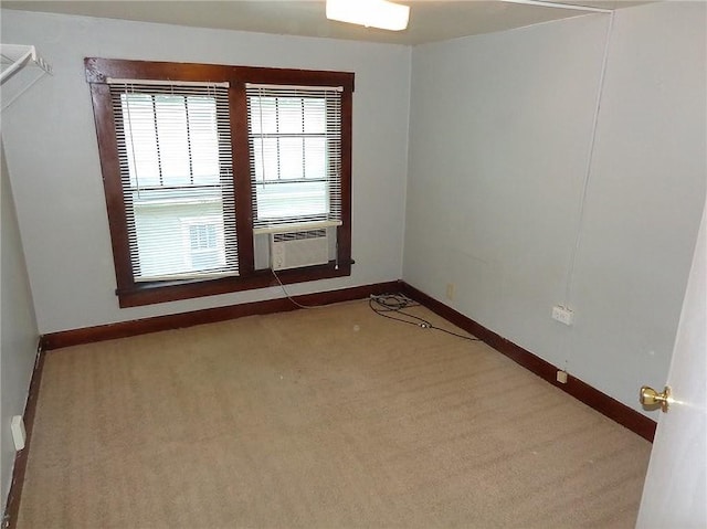 1915 S Broadway St, Pittsburg, KS 66762 - carpeted empty room with baseboards and cooling unit