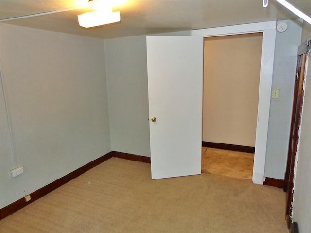 1915 S Broadway St, Pittsburg, KS 66762 - spare room featuring carpet and a smoke detector