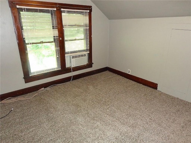 1915 S Broadway St, Pittsburg, KS 66762 - additional living space featuring carpet floors, vaulted ceiling, and cooling unit