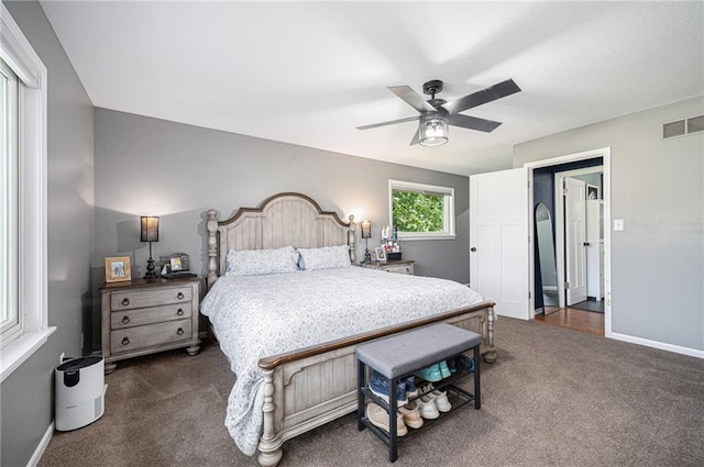 37156 State Hwy N, Barnard, MO 64423 - bedroom with dark carpet and a ceiling fan